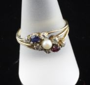 An 18ct gold, ruby, sapphire, diamond and cultured pearl dress ring, in a triple setting, size R.