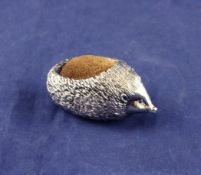 A 1980`s novelty silver pin cushion, modelled as a hedgehog, with textured spines, A Ltd,