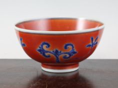 A Chinese underglaze blue coral ground bowl, Xuande mark, Kangxi period, the interior painted with a