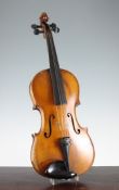 A 19th century German violin, with interior label for Joseph Guarnerius, 14.25in. two piece back,