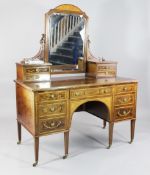 An Edwards & Roberts Edwardian mahogany and marquetry inlaid dressing table, with mirror back