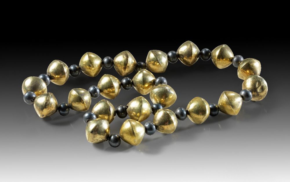 Beautiful necklace made of gilded biconical and round silver beads. Mochica, about 100 - 750 A.D.
