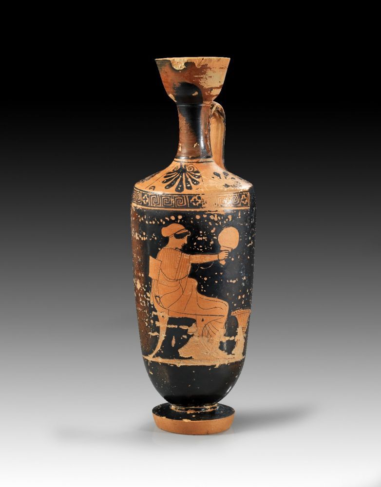 Attic red-figure lekythos, manner of the Aischines Painter. 460 - 450 B.C. On the corpus a young