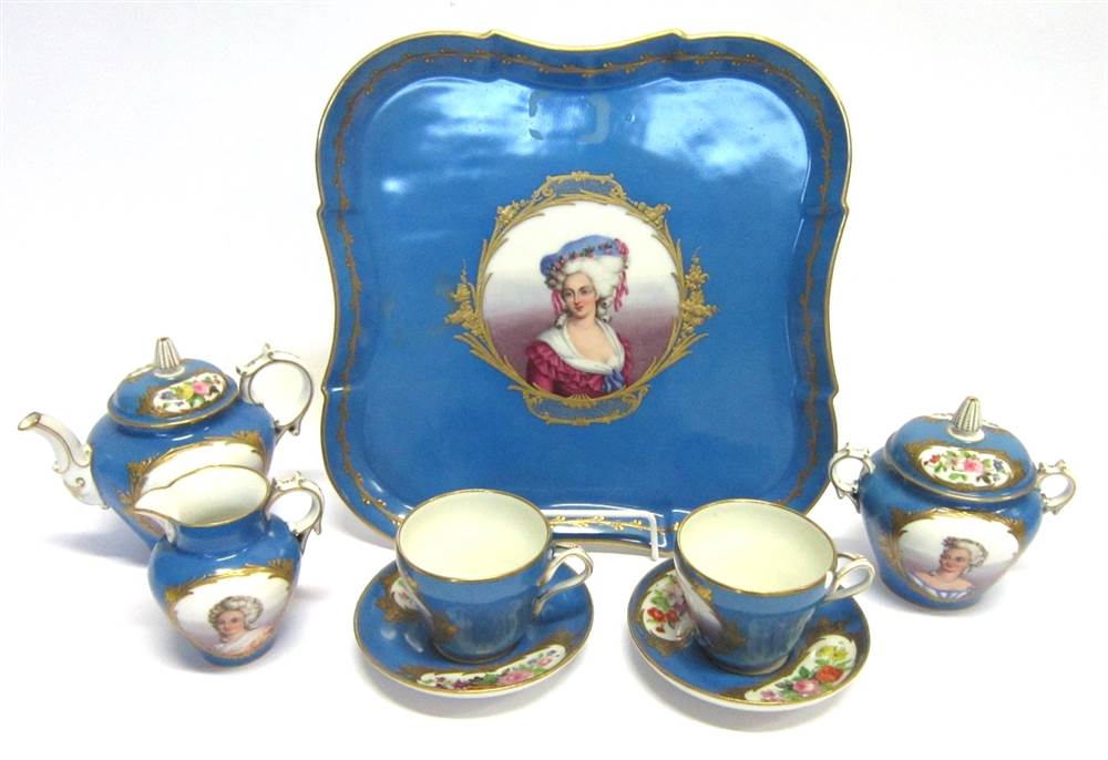 A 19TH CENTURY FRENCH CABARET TEA SERVICE comprising a teapot, lidded sucrier, cream jug, two cups