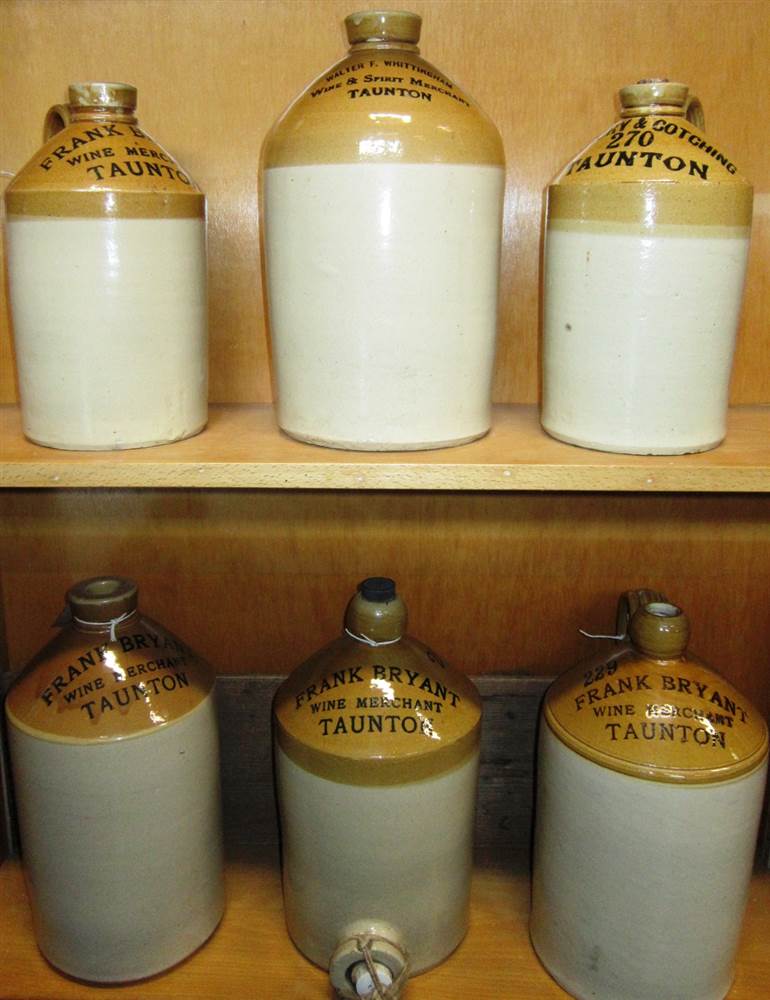 SIX STONEWARE BOTTLES OF TAUNTON INTEREST all with printed marks, comprising four `Frank Bryant /
