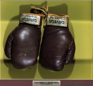 A pair of vintage boxing gloves with the left hand double signed by Tony DeMarco and Carmen Basilio,