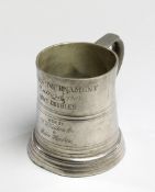 An early tennis trophy won by the legendary American player William T. Tilden, 11 years old at the