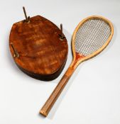 A lawn tennis racquet press by W.J. Knott, Wimbledon Sports  Works,
mahogany with dividers for