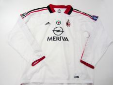 Paolo Maldini: a signed white AC Milan No.3 jersey season 2003-04,
signed to the reverse between the