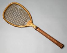 A "Prince" racquet with slightly tilted head by G.G. Bussey circa mid-1880s,
supplied by H.