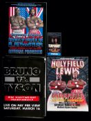Two official venue programmes for the Evander Holyfield v Lennox Lewis World Heavyweight
