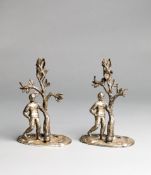 A pair of electroplated Victorian footballer candlesticks,
stamp for W W H & Co. (registered between
