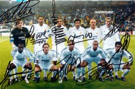 A Real Madrid colour photograph signed by 9 members of the team, 7 ½ by 11 in., signatures in