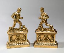 A pair of andirons modelled as a footballer & a rugby player circa 1910,
gilded cast iron, cricket