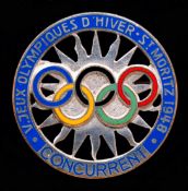 A St Moritz 1948 Winter Olympic Games participant's badge,
openwork design incorporating Olympic