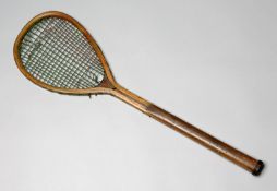 A tilt head lawn tennis racquet circa 1875,
maker unknown, throat cracked