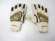 A signed pair of Gianluca Pagliuca goalkeeping gloves,
the right-hand signed on the palm, the left