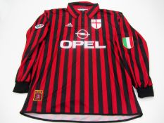 Andriy Shevchenko: a red & black striped AC Milan No.7 Serie A 'Centenary' jersey season 1999-