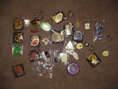 A collection of millennium racing badges,
including Newmarket, Goodwood, Ascot, Newbury, Sandown,