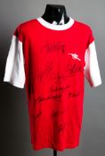 An Arsenal retro jersey signed by 10 members of the 1970-71 Double winning team,
signatures in black