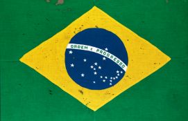 A Brazilian national flag signed by the 1970 World Cup winning squad, signatures in red felt tip