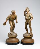 A pair of French 19th century spelter figures with the unusual sporting subject of jeu de balle au