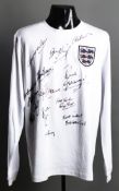 An England Legends signed retro No.10  jersey,
13 signatures in black marker pen including Charlton,