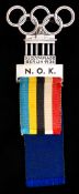 A Berlin 1936 Olympic Games National Olympic Committee member's badge,
Olympic rings over the