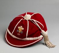 A red Wales U-21 international rugby cap,
modern, undated