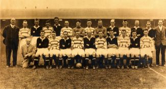 A period photograph of the Celtic and Hearts teams posing before the match marking the opening of
