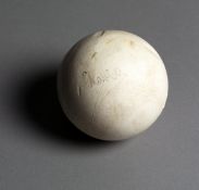 A polo ball signed by HRH Charles Prince of Wales, sold together with a colour photograph of Charles