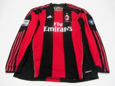 Antonio Cassano: a red & black striped AC Milan No.99 jersey Serie A jersey season 2010-11,
long-