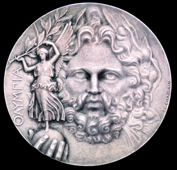 A winner's prize medal from the first modern Olympic Games at Athens in 1896,
designed by Jules