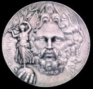 A winner's prize medal from the first modern Olympic Games at Athens in 1896,
designed by Jules