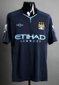 Patrick Vieira: a dark blue Manchester City No.24 away jersey,
short-sleeved, Premier League badges,
