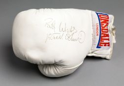A boxing glove signed by Frank Bruno,
a white left-hand Lonsdale signed and inscribed BEST WISHES