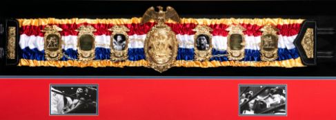 A unique replica of Muhammad Ali's first championship boxing belt for the defeat of Sonny Liston