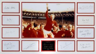A signed England 1966 World Cup display,
the late Bobby Moore's autograph represented by a facsimile