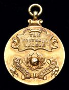 A Newcastle United Director's Football League Division One Championship medal season 1926-27,
in