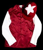 A set of Sheikh Mohammed racing silks,
by Gibson Saddlers of Newmarket, maroon jacket, white