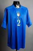 Giorgio Chiellini: a signed blue Italy No.2 Athens 2004 Olympic Games jersey,
signed to the