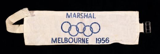 A Melbourne 1956 Olympic Games marshall's armband,
printed in blue with Olympic Rings and reading