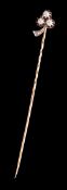 A gold and diamond gentleman's shamrock stick pin circa 1905-10, three good sized diamonds on the