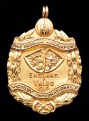 A 9ct. gold Football Association England v Wales 1919 Victory International medal,
inscribed THE