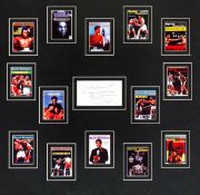 A Muhammad Ali signed tribute display, with a central white card signed by Ali in blue pen and