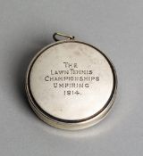 A silver cased umpiring tape measure from the 1914 Wimbledon Lawn Tennis Championships,
hallmarked