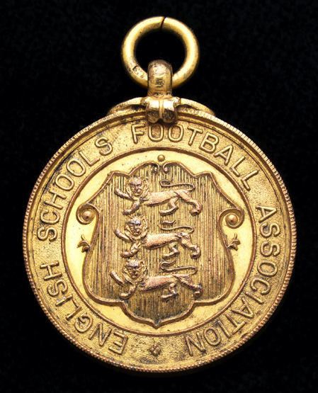 A silver-gilt English Schools Football Association medal awarded to John Talbut for the England v