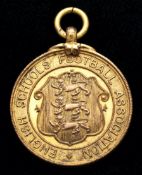 A silver-gilt English Schools Football Association medal awarded to John Talbut for the England v