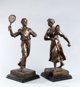 A large pair of bronzes of a gentleman and lady tennis player,
bearing a signature on the base, E.