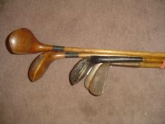 A George Duncan scared-neck brassie circa 1920,
with hickory shaft; together with four hickory